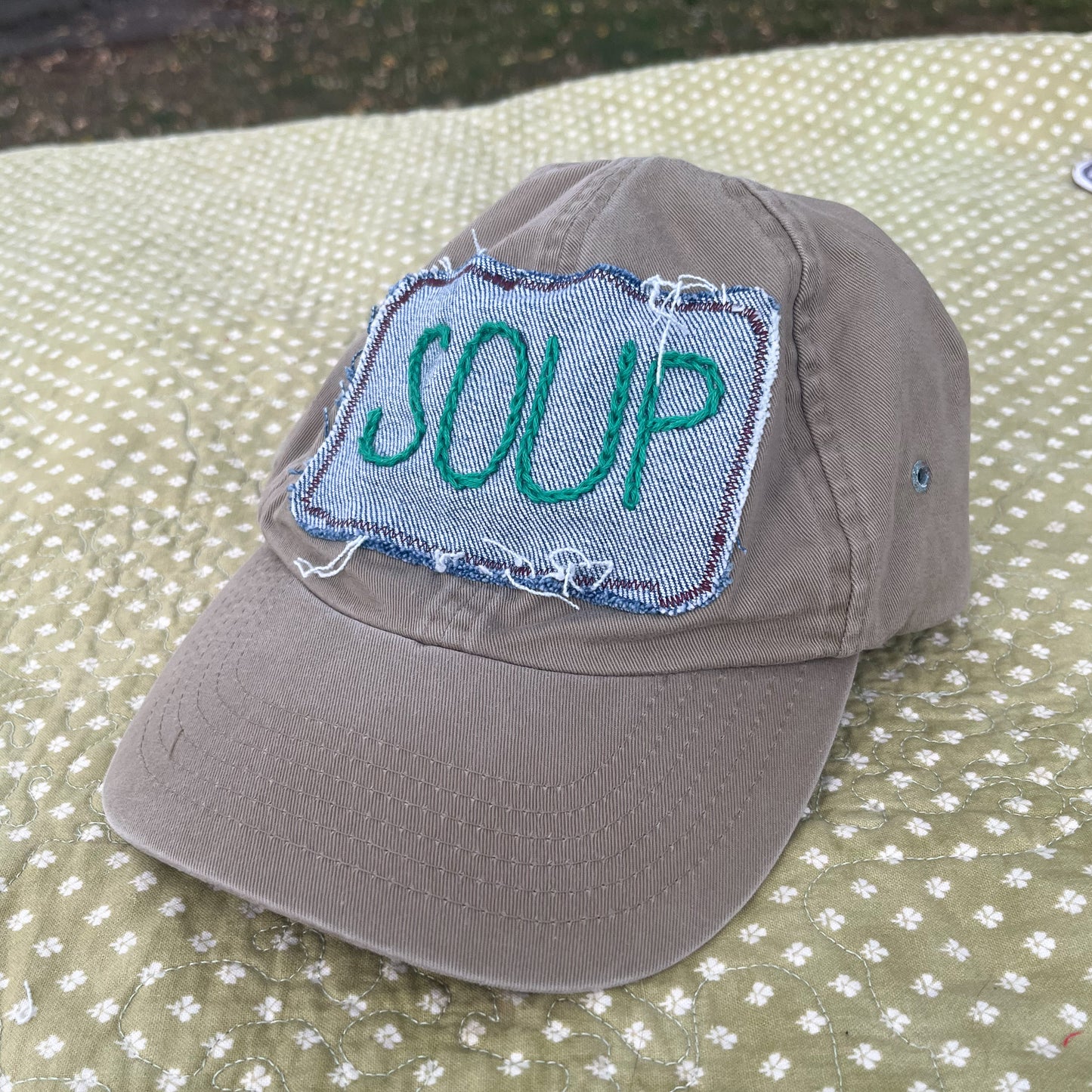 SOUP hat - khaki w/ green letters