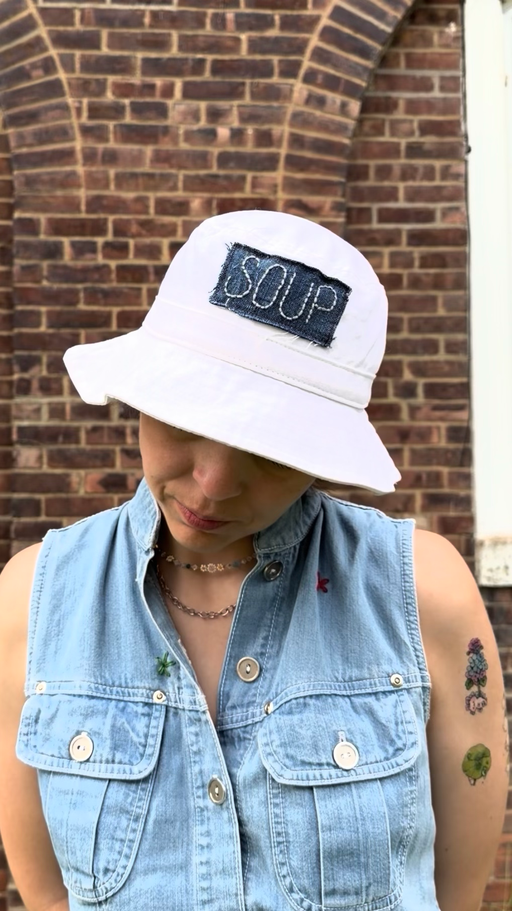 white SOUP bucket hat