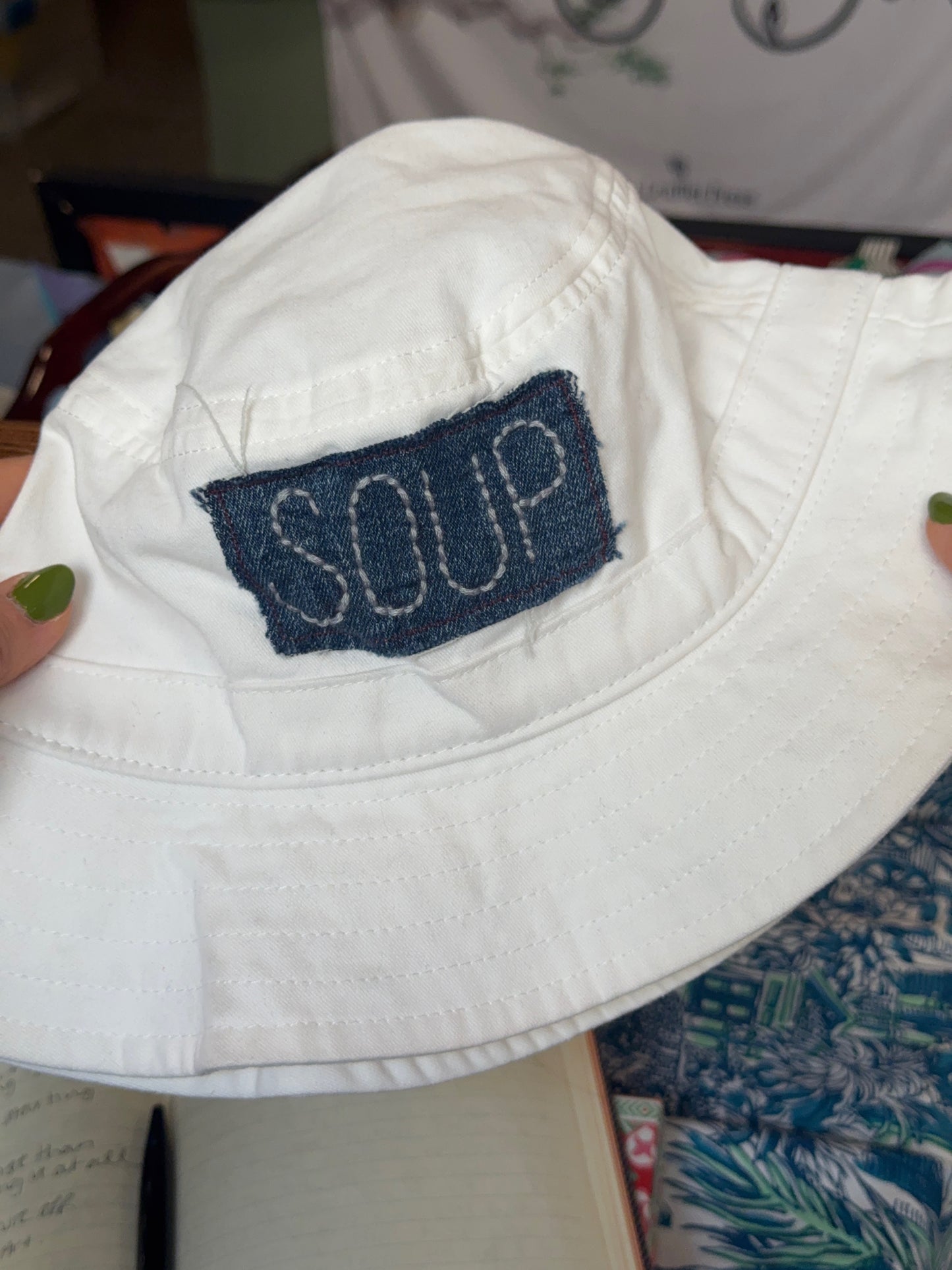 white SOUP bucket hat